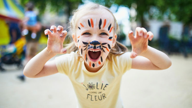 Photo of young girl with face painted