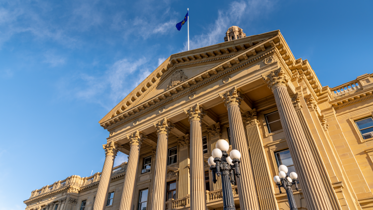 Ground view looking up at the Alberta legislature building