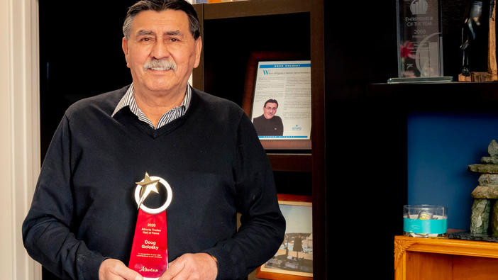 A photo of Doug Golosky with his award.