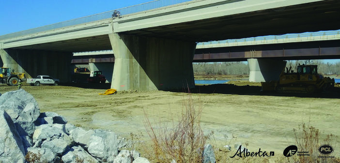 Looking Northwest at in-stream berm construction on East bank.