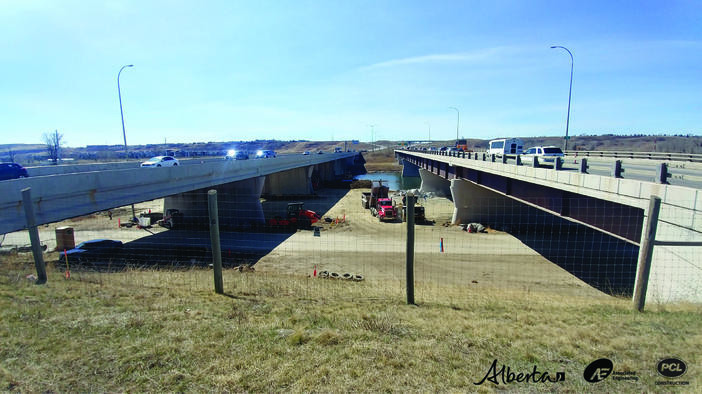 Pre-demolition – Looking west over Bow River.