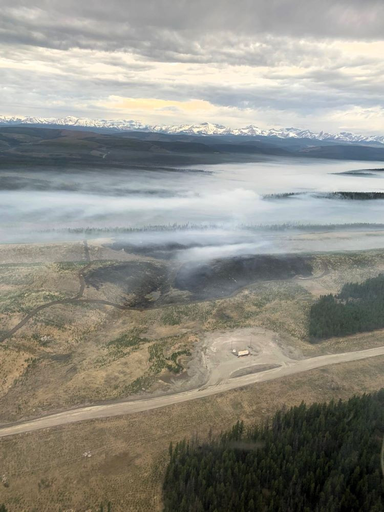 Smoke settles over the valley.