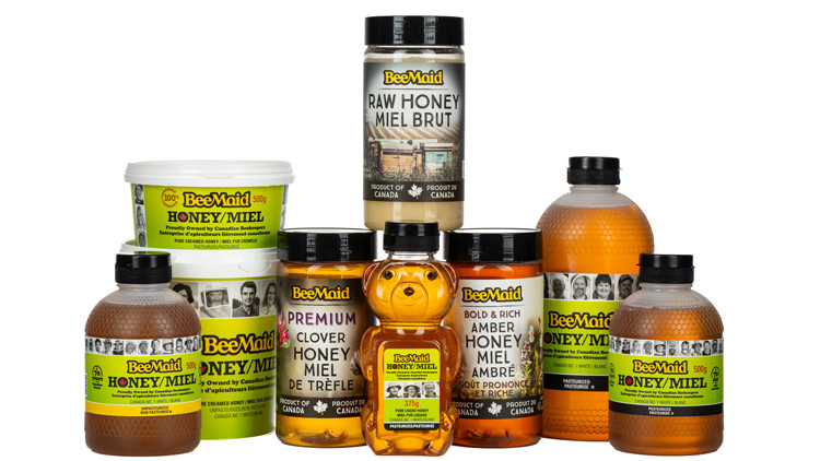 Multiple containers of Bee Maid honey