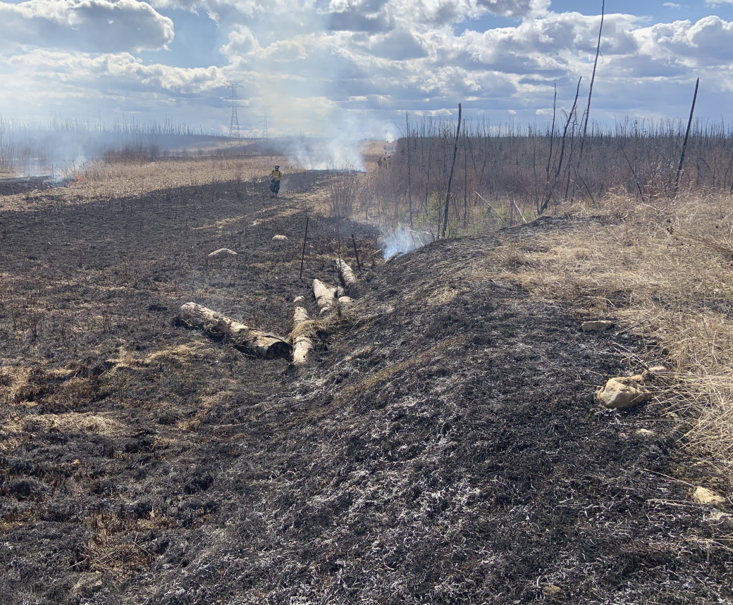 Image of a hazard reduction burn being done near Saprae Creek estates in Fort McMurray on April 23, 2025.