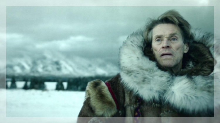 Close-up of man in heavy winter fur coat with snow scene behind him.