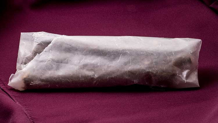 Photo of branch pieces wrapped in wax paper