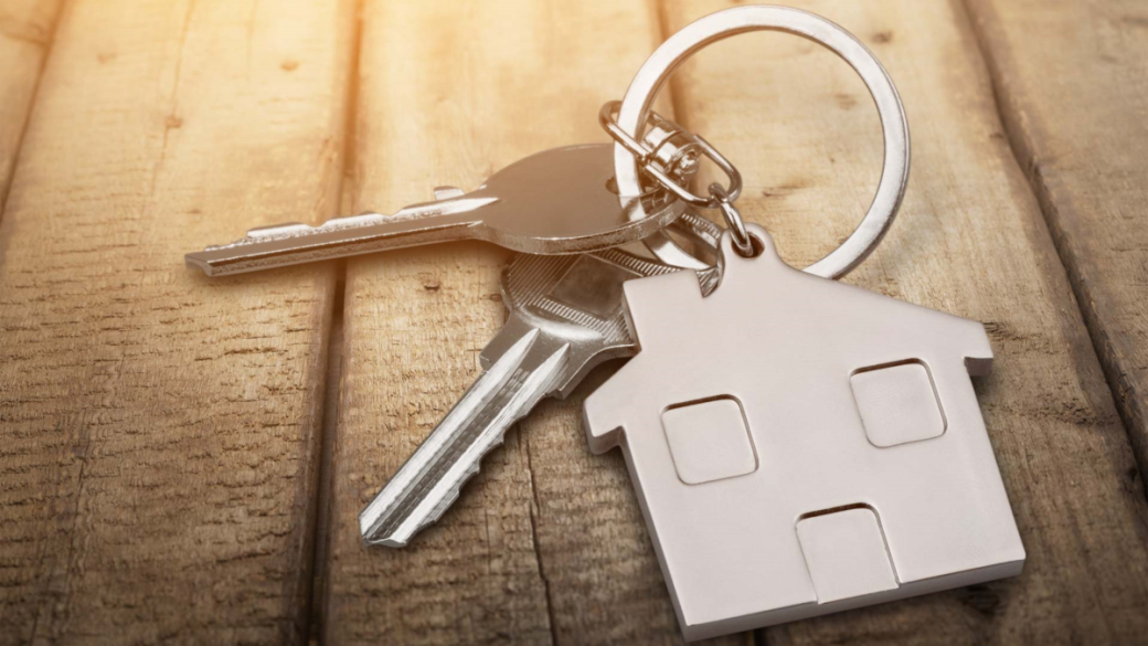 Photo of a keychain with a house