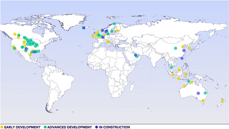 World map with coloured dots (yellow: early development; teal: advanced development; blue: in construction