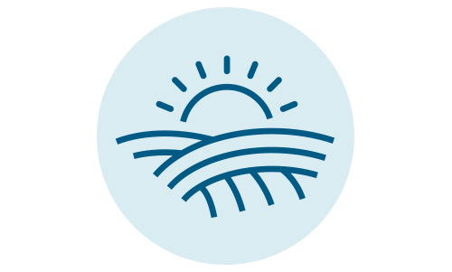 Icon of sun rising over the land.