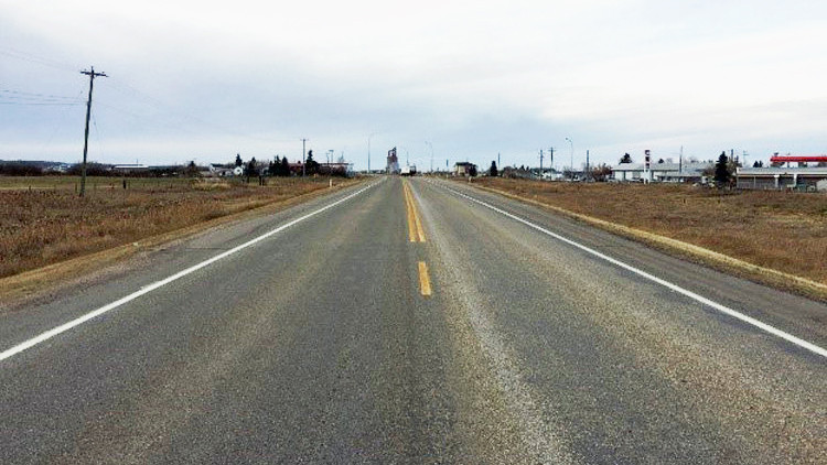 Within the Town of Lamont near the start of the grade widening section