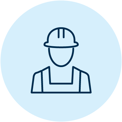 A person in a hard hat and work clothes