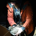 Woman holding a Sage-Grouse hen 