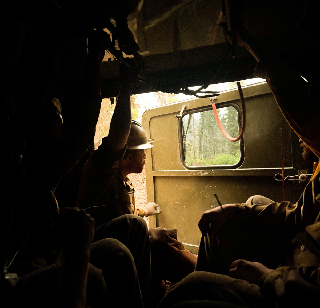 Firefighters dismount after transport on HWF036 (June 2025)