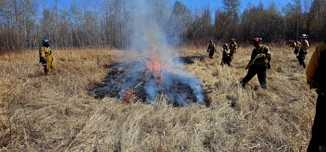 Firefighters burn specific box area as part of a hazard-reduction burn in Chateh