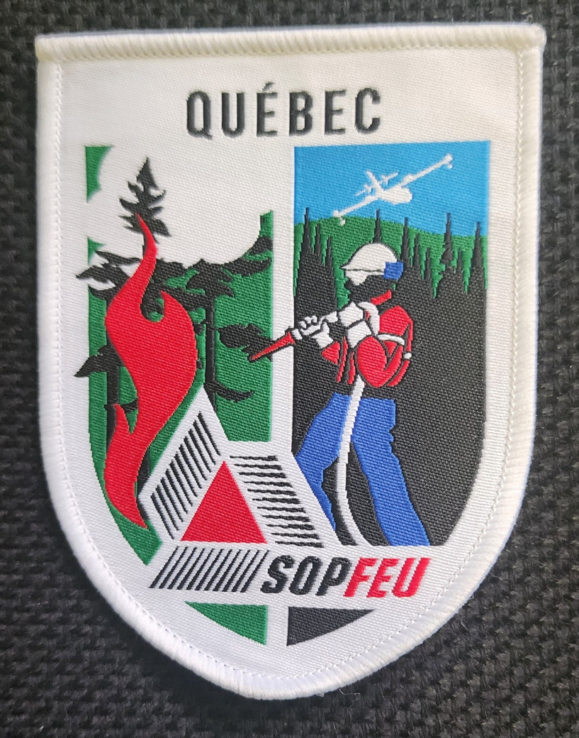 Quebec shoulder flash