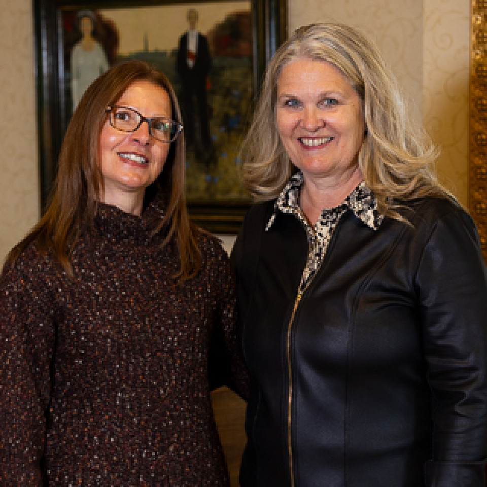 Portrait photo of 2 representatives of Seniors for Kids Society